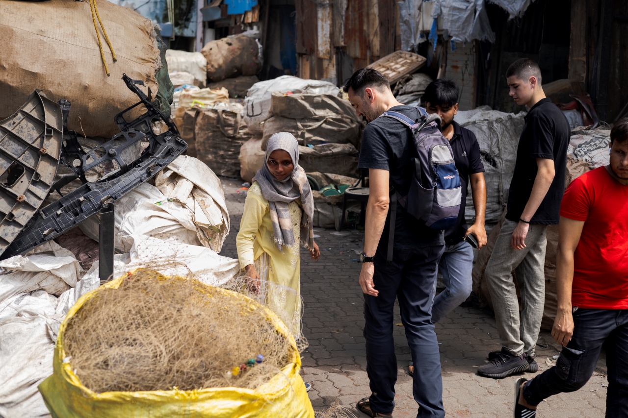 Walking through Dharavi's massive recycling zone — a working community that processes thousands of tonnes of waste every day.
