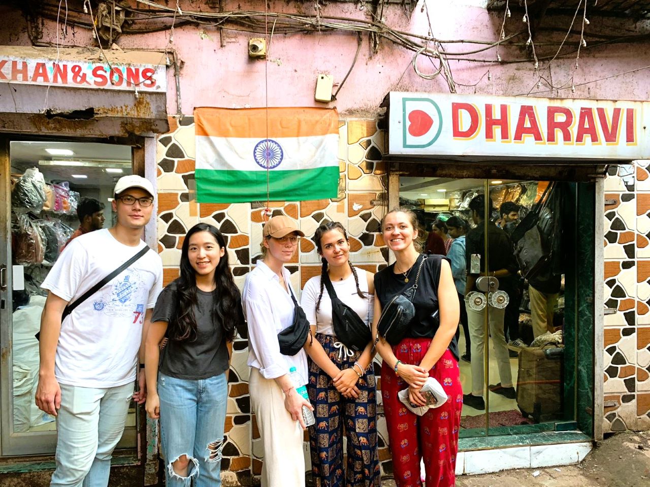 Tourists from around the world starting their Dharavi slum tour at the iconic Dharavi entrance in Mumbai.