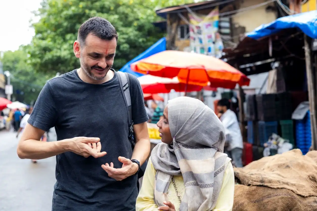 Real moments and real connections on the Mumbai Dabbawala guided tour - travellers from around the world discovering the streets and stories of Mumbai with Cityscape Mumbai Tours