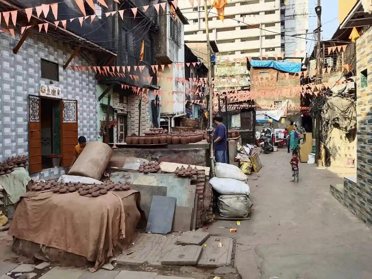 A quiet morning walk through Kumbharwada on the Mumbai Dabbawala guided tour, where ancient pottery craft still lives in the heart of the city