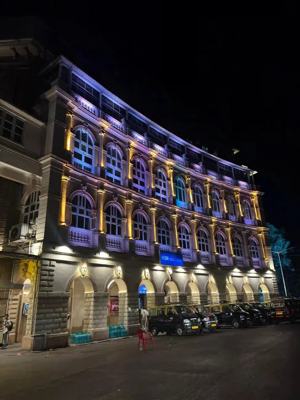 Heritage architecture glowing beautifully, one of many stunning sights on the Mumbai night tour.
