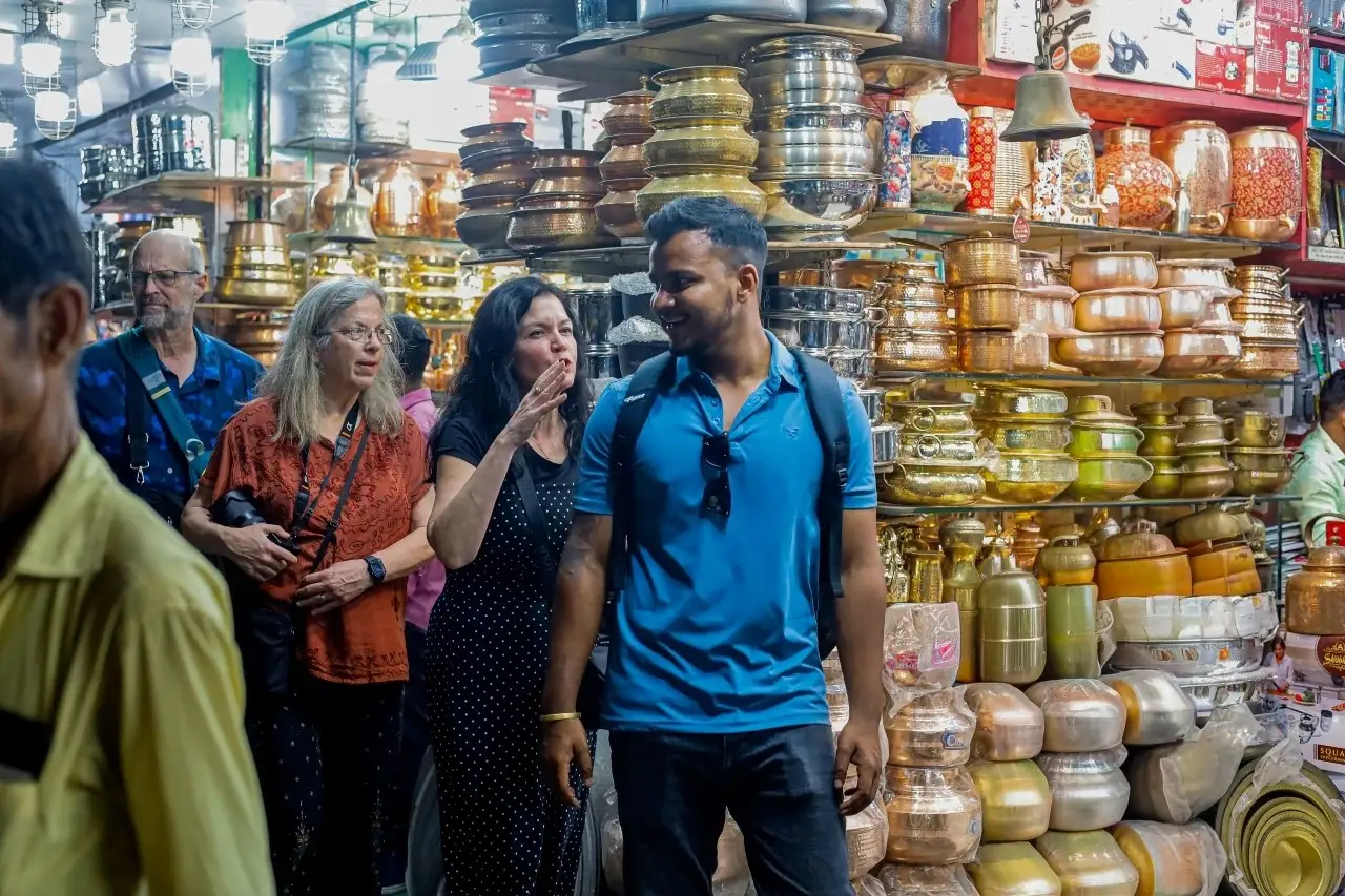 Exploring Crawford Market with our expert guide on the Mumbai night tour
