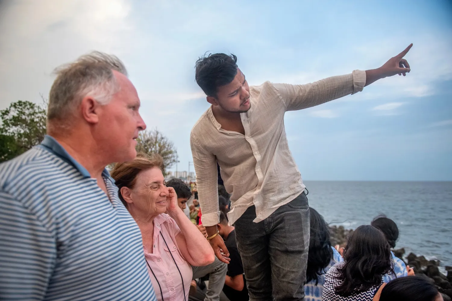 Our expert local guide points out key landmarks along the Mumbai sea shore during a private Mumbai Shore Excursion with Cityscape Mumbai Tours