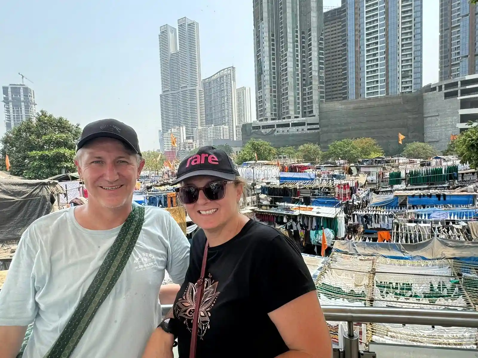 Travellers overlook Mumbai's famous open air laundry during their mumbai half day city tour with Cityscape Mumbai Tours