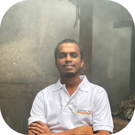 Cityscape Mumbai Tours, Swapnil Taral, Developer and SEO Executive, smiling in a branded polo shirt in Dharavi